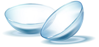 two contact lenses lying down on a transparent surface